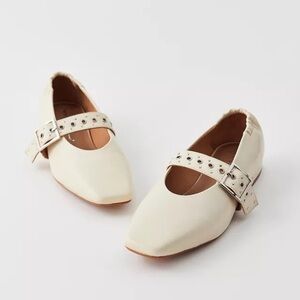 INTENTIONALLY BLANK Cream Flats with Silver Buckle